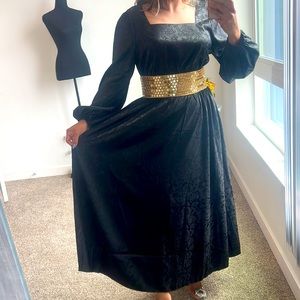 Stylish black dress with gold lace